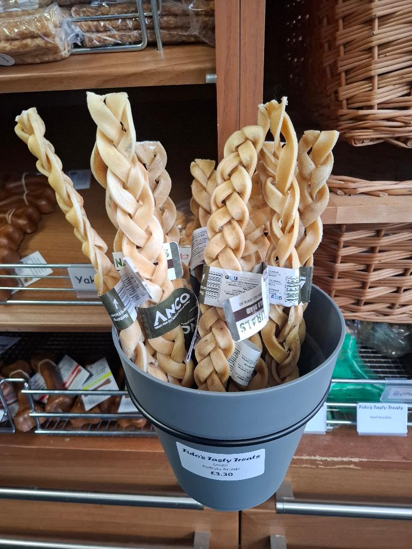 Bucket of Large Buffalo Braids dog treats from Fido's Tasty Treats