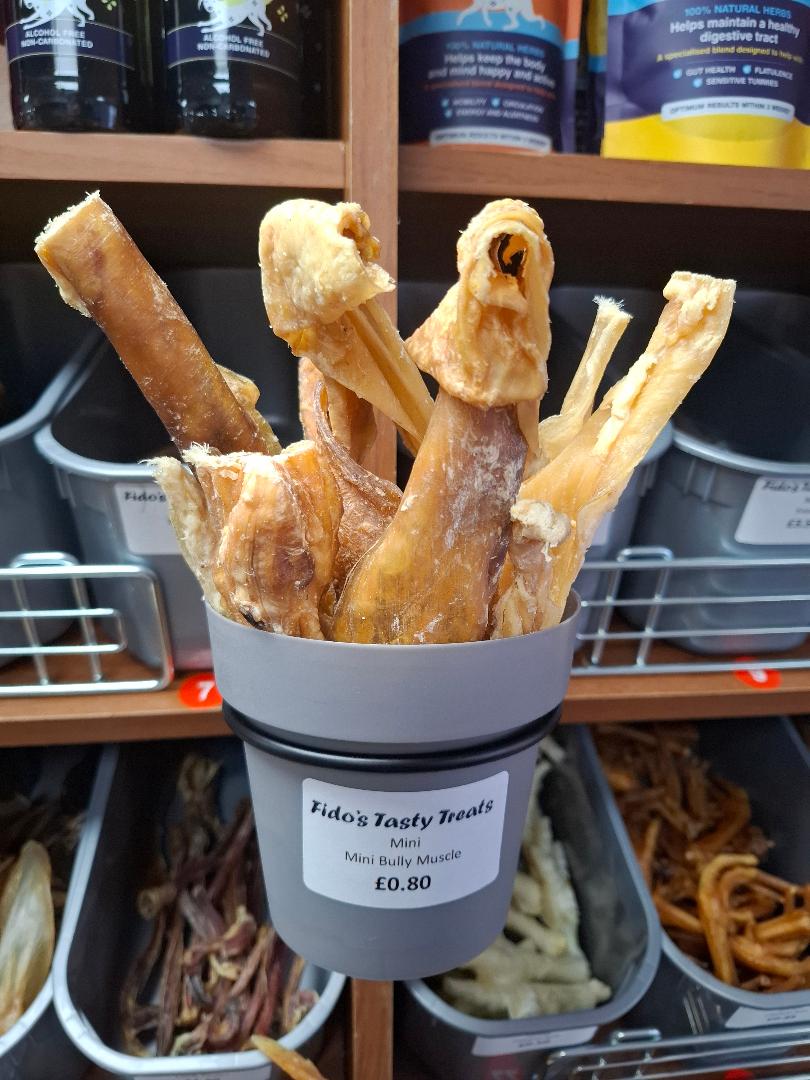 Bucket of Mini Bully Rolls dog treats from Fido's Tasty Treats